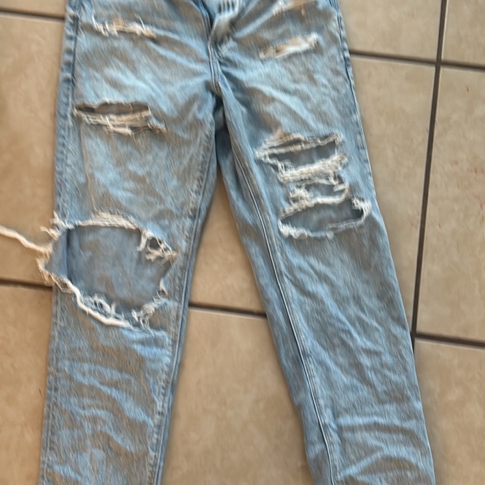 Distressed Light Blue Jeans